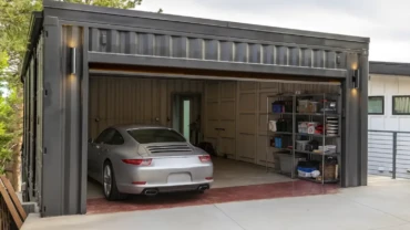 shipping container garage with a car