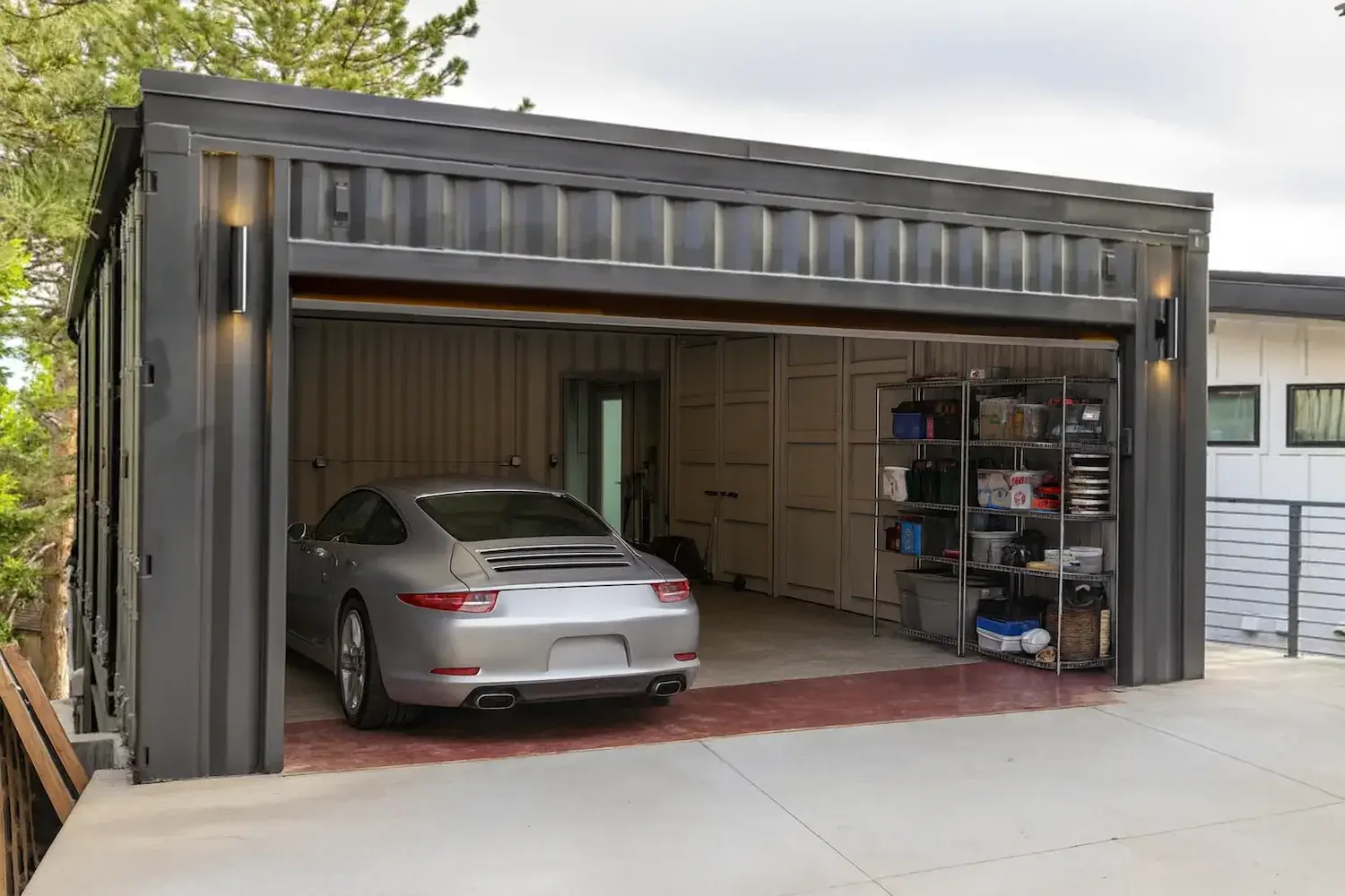 shipping container garage with a car
